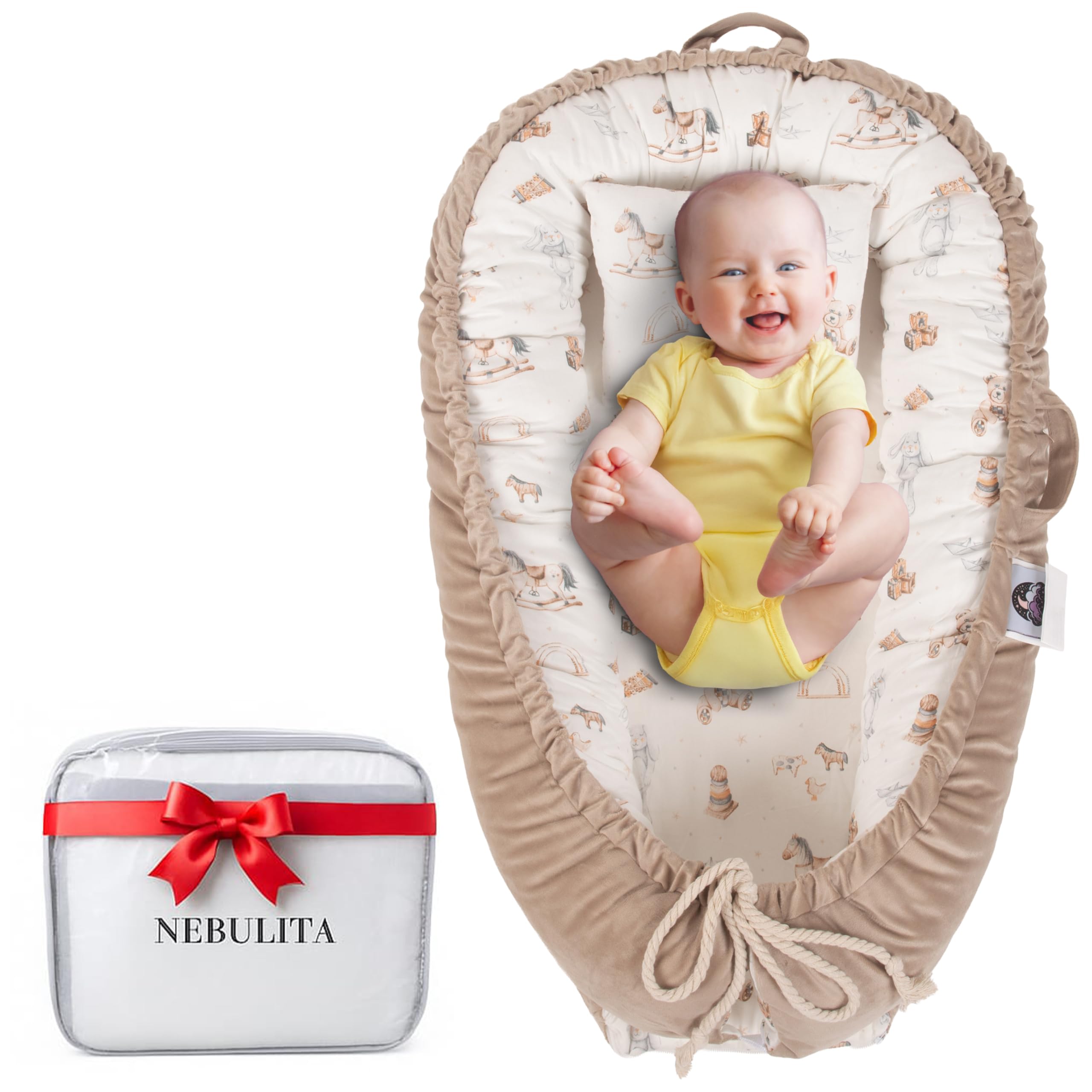 Nebulita newborn lounger cream with folded base enabling gentle supervised feeding.