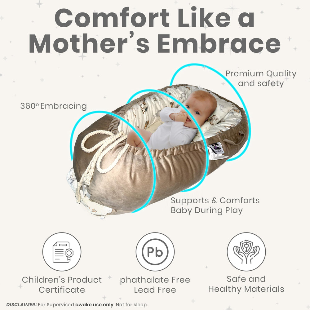 Nebulita newborn lounger cream featuring modern neutral patterns for nursery decor.
