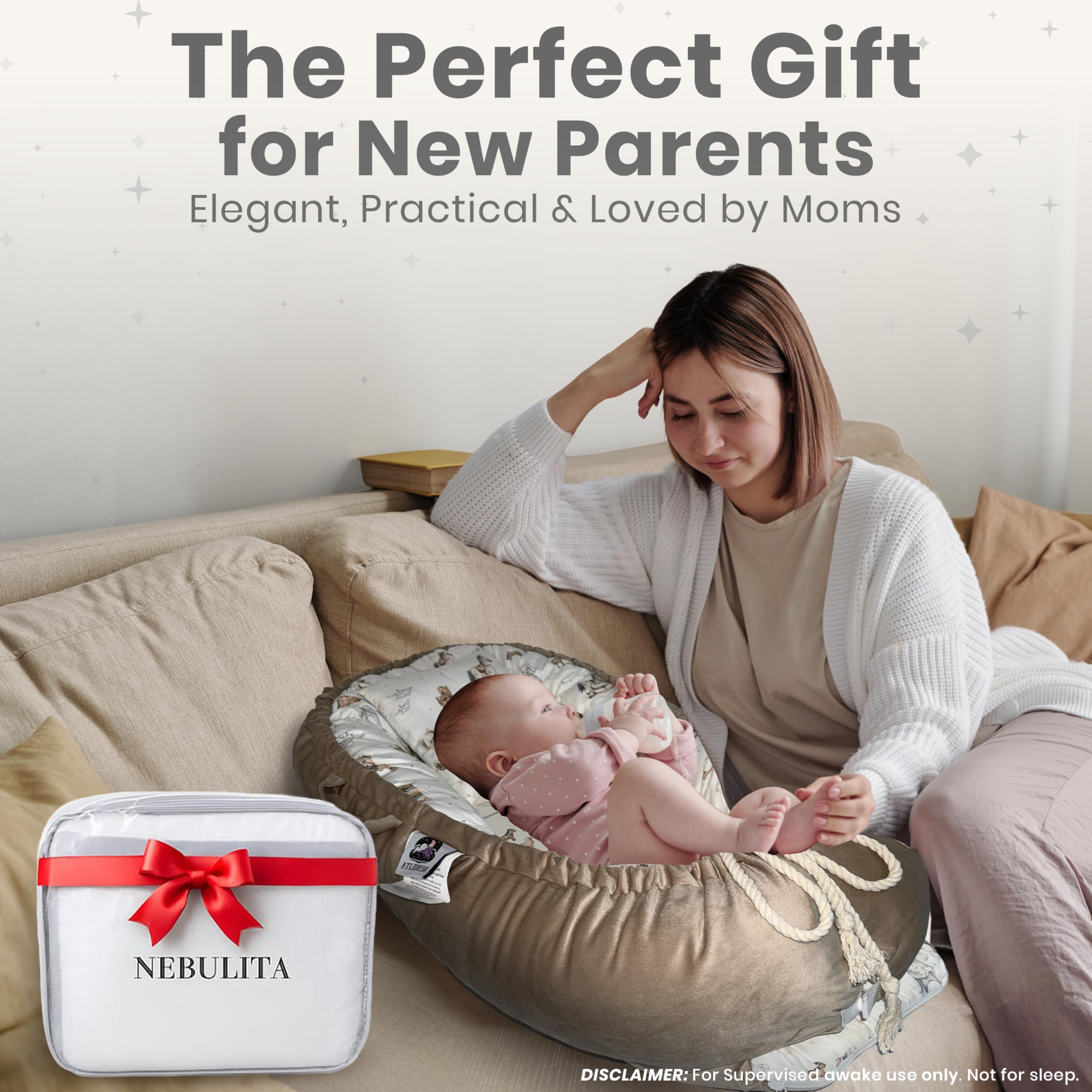 Nebulita newborn lounger cream showing soft side panels for awake play.