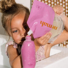 Nemah tear-free lather shown on baby hair and skin.
