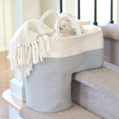 NEObirdie stair basket in fog grey on stairs for easy clutter storage