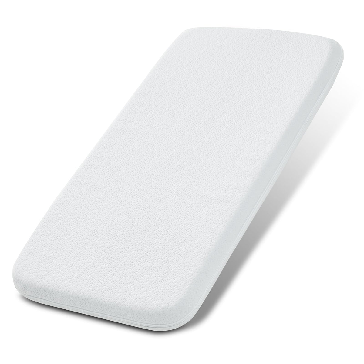 NeoBorn baby bassinet pad top view with dual-sided memory foam for growing infants.