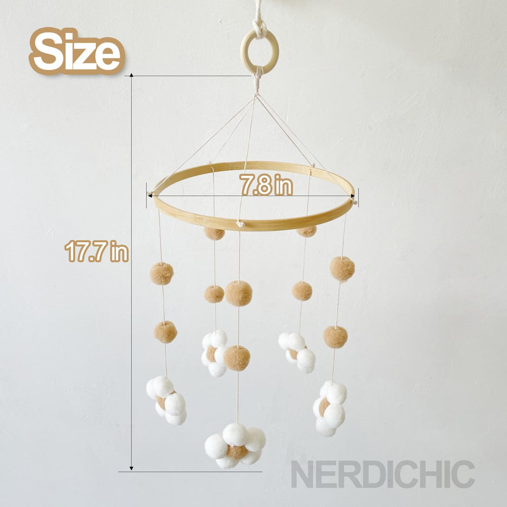 Nerdichic crib mobile with soft felt petals enhances visual interest and nursery decor.