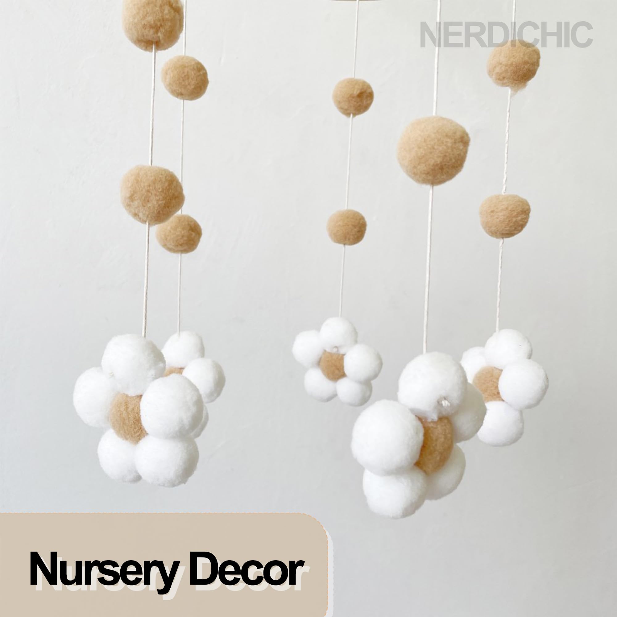 Nerdichic newborn gift mobile with neutral tones makes a thoughtful baby shower present.