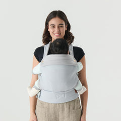 NEST BLANCHE baby carrier back view shows balanced support for wearers