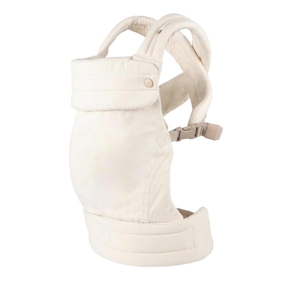 Nest Blanche ergonomic baby carrier supports newborn positioning for hands-free moments