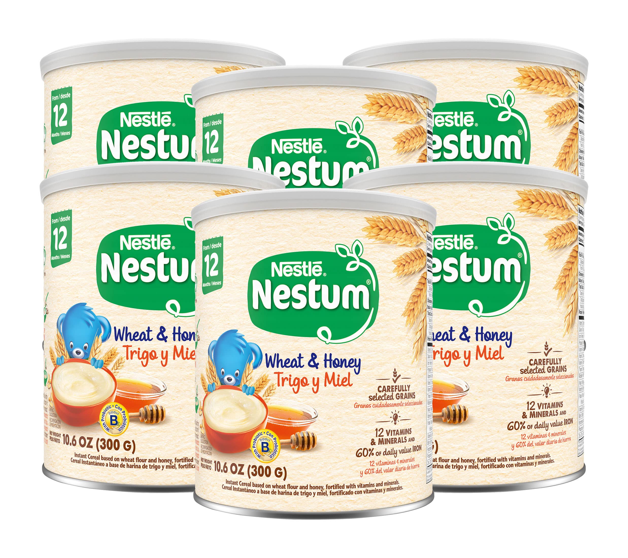 Nestum infant cereal canister with spoon highlighting iron and vitamins for growth