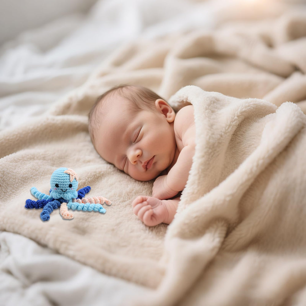 Blue newborn comfort octopus for NICU and home daily use.