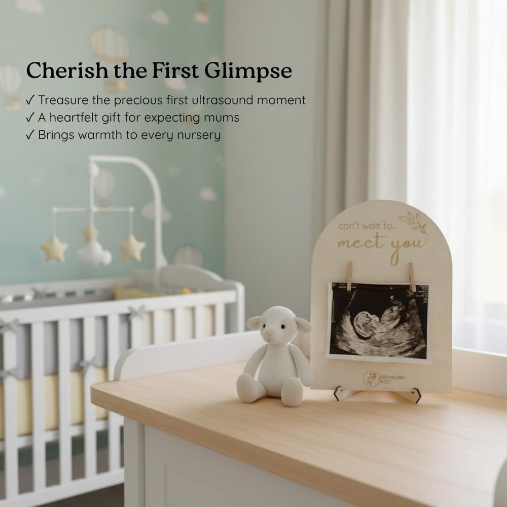 Newborn Nest sturdy easel stand for bedside or shelf display.