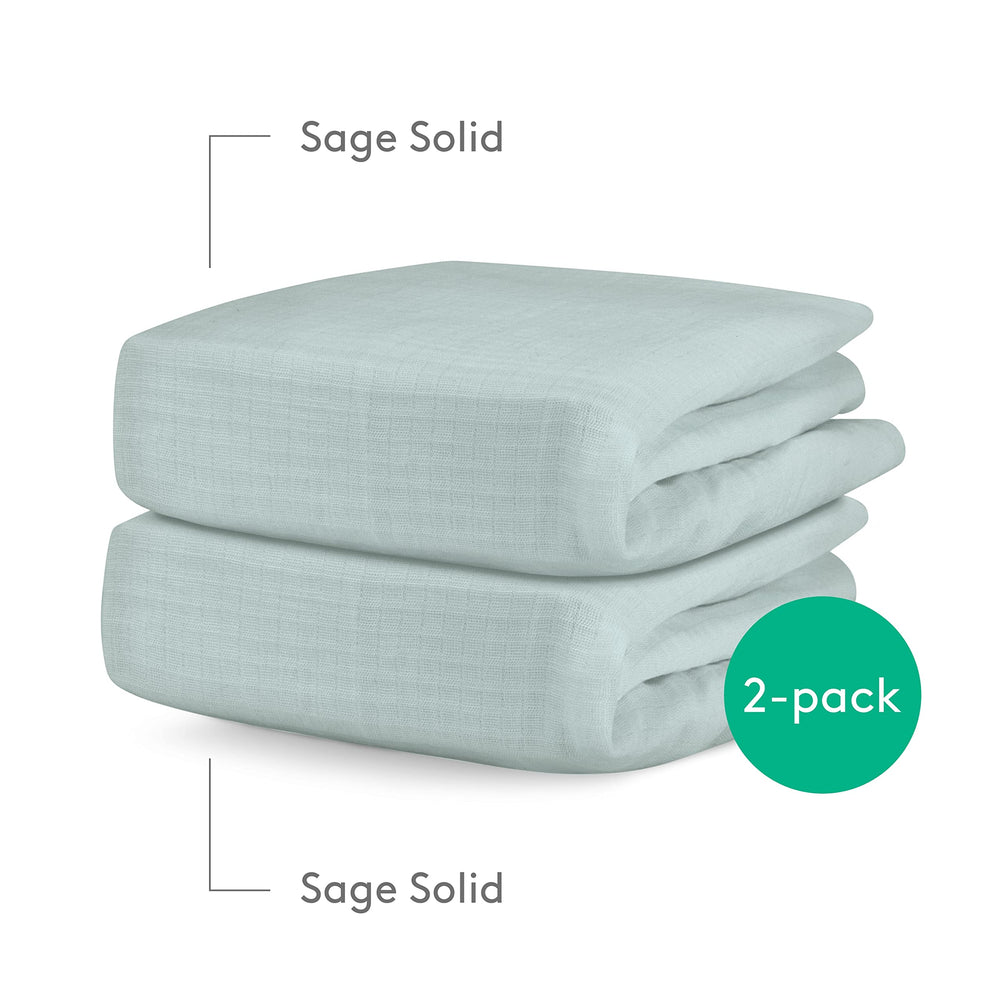Newton Baby 24x38 fit crib sheets demonstrating precise sizing for a secure sleep setup.
