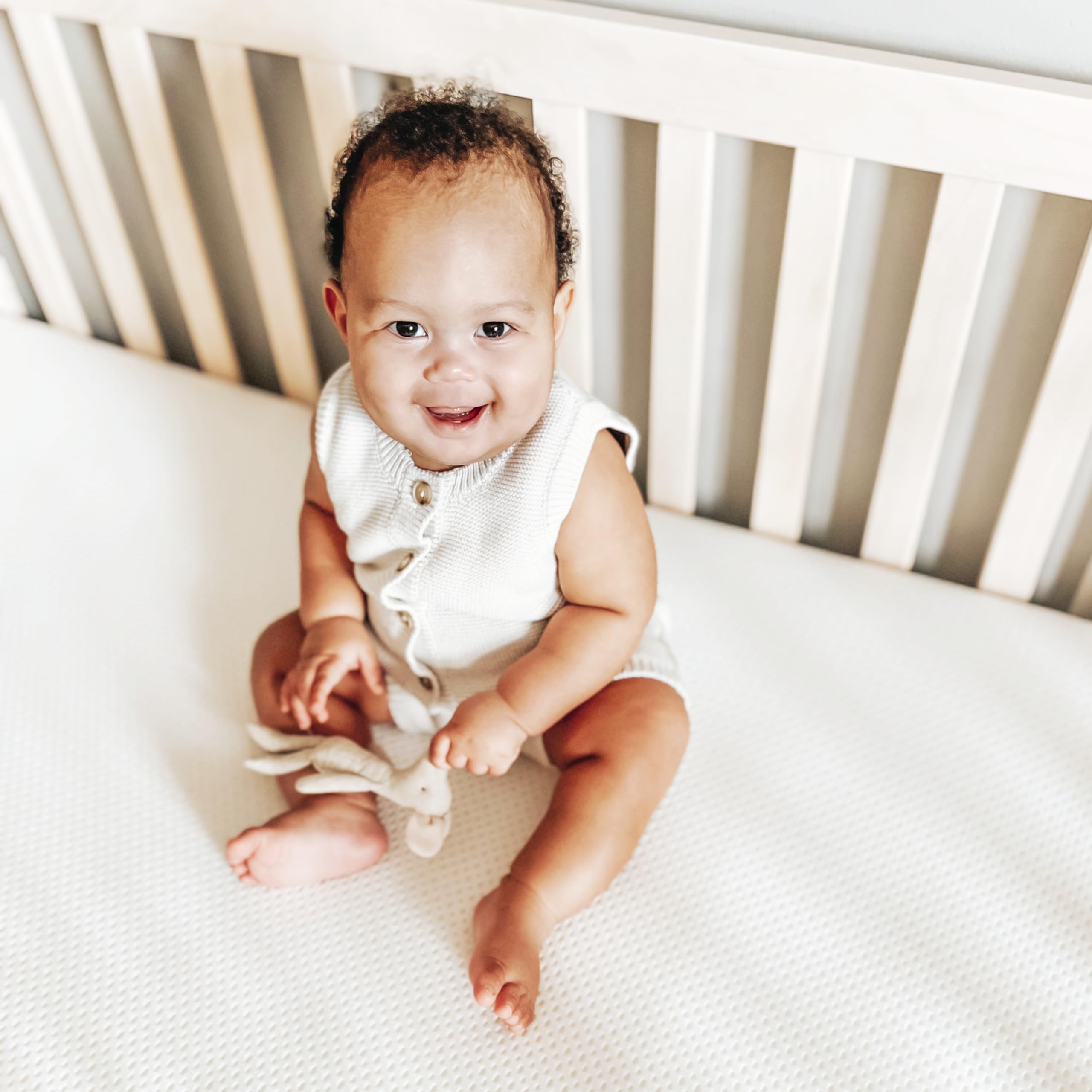 Newton Baby Essential firm support for longer, more comfortable baby sleep.
