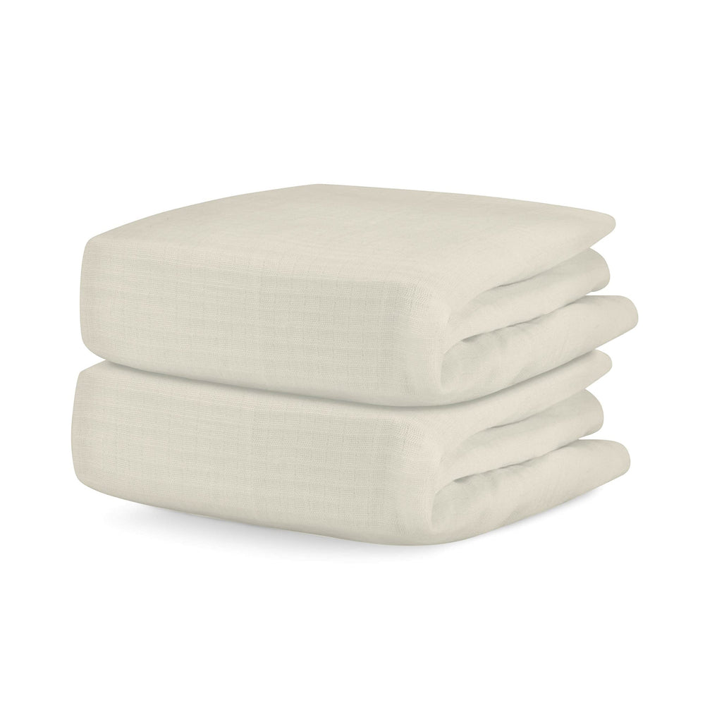 Newton Baby fitted crib sheet in ultra-breathable organic cotton for cool baby sleep.