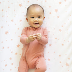 Newton Baby two-pack packaging view emphasizing convenience and fresh sheets on hand