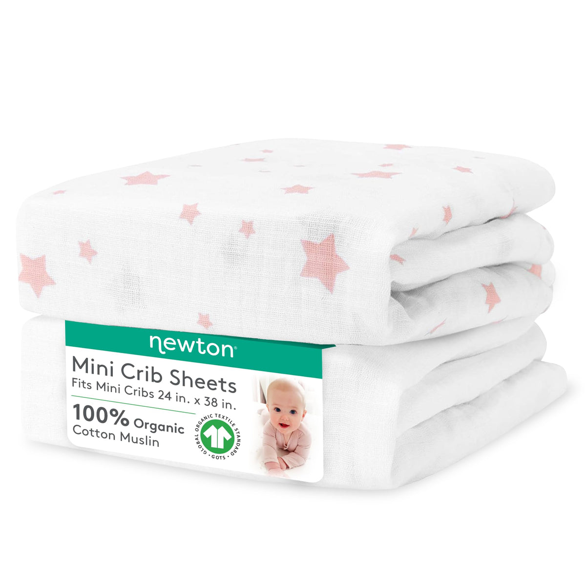 Newton Baby fitted mini crib sheets in Stardust Coral close-up showing breathable organic muslin for baby comfort