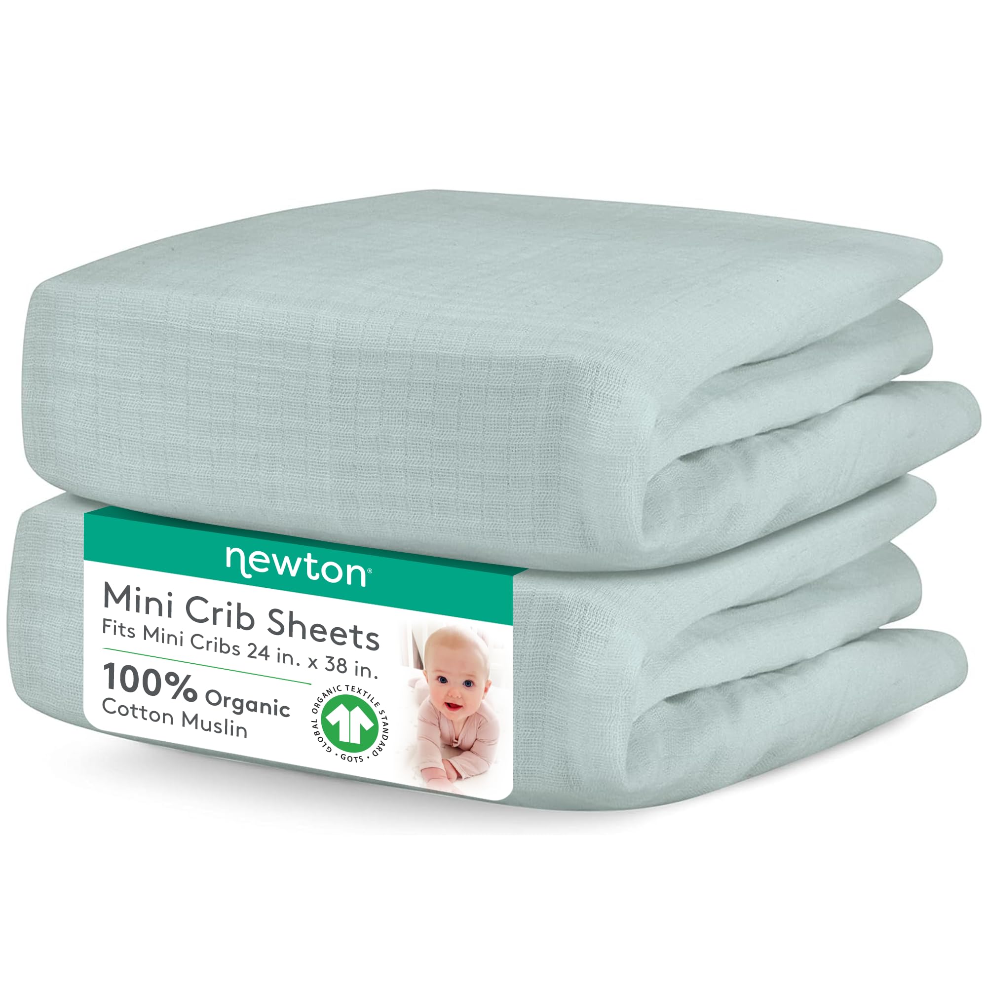Newton Baby sage mini crib sheets close-up highlighting breathable organic muslin for baby comfort.