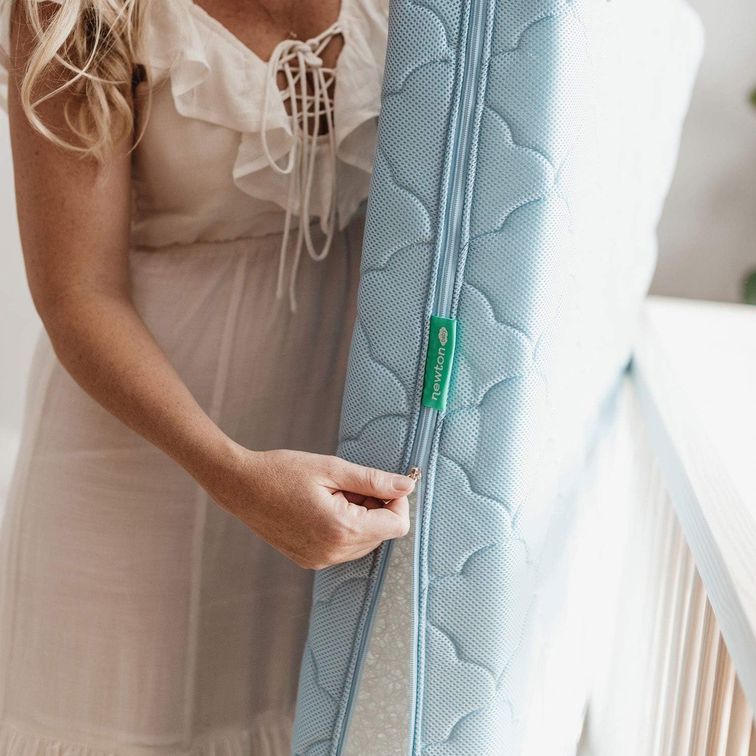 Newton Baby spare cover supports easy night changes to minimize wakeups.