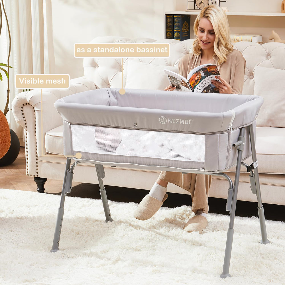 Nezmdi bassinet folds flat for travel and compact storage
