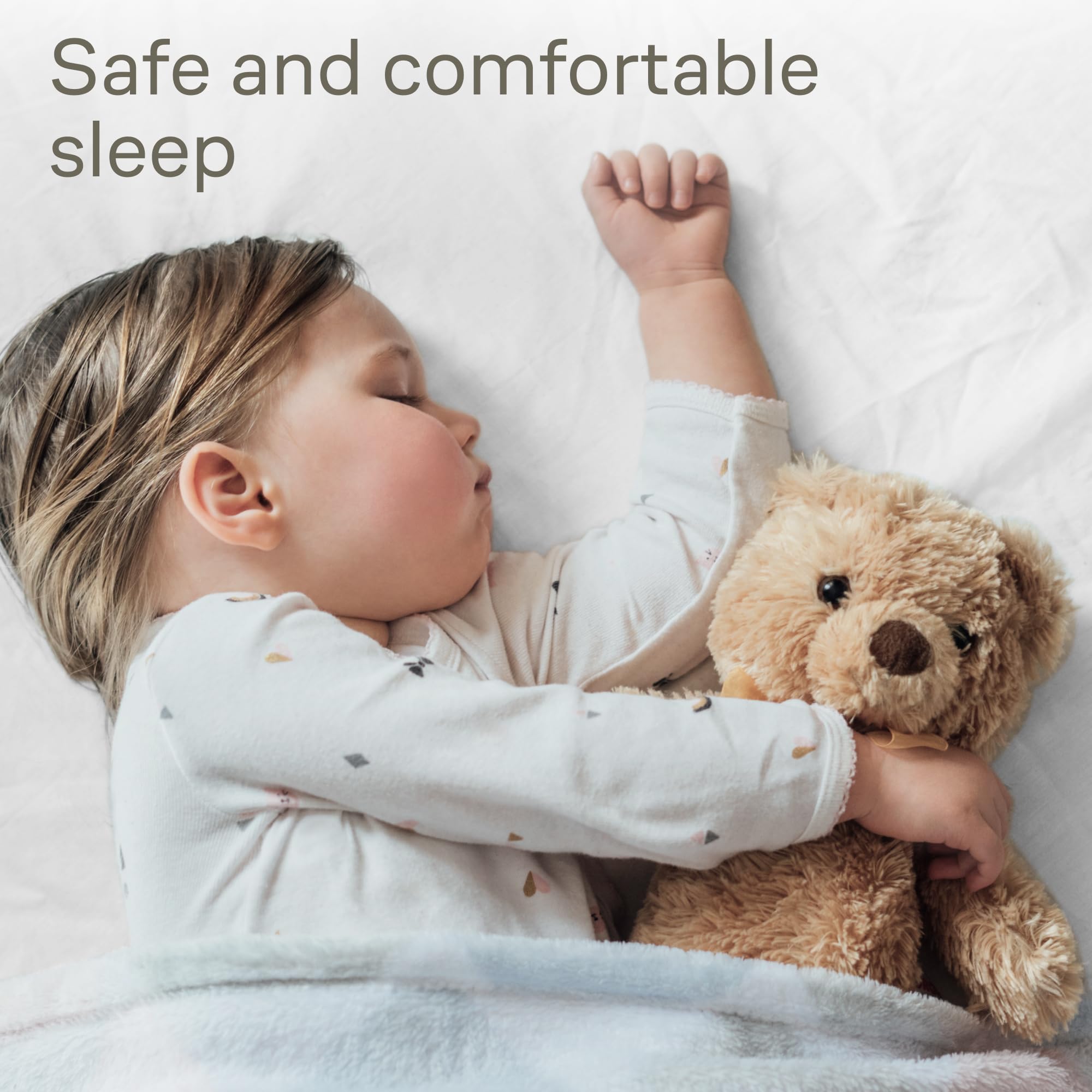Niagara Sleep Solution gray 52x28 crib protector on crib mattress.