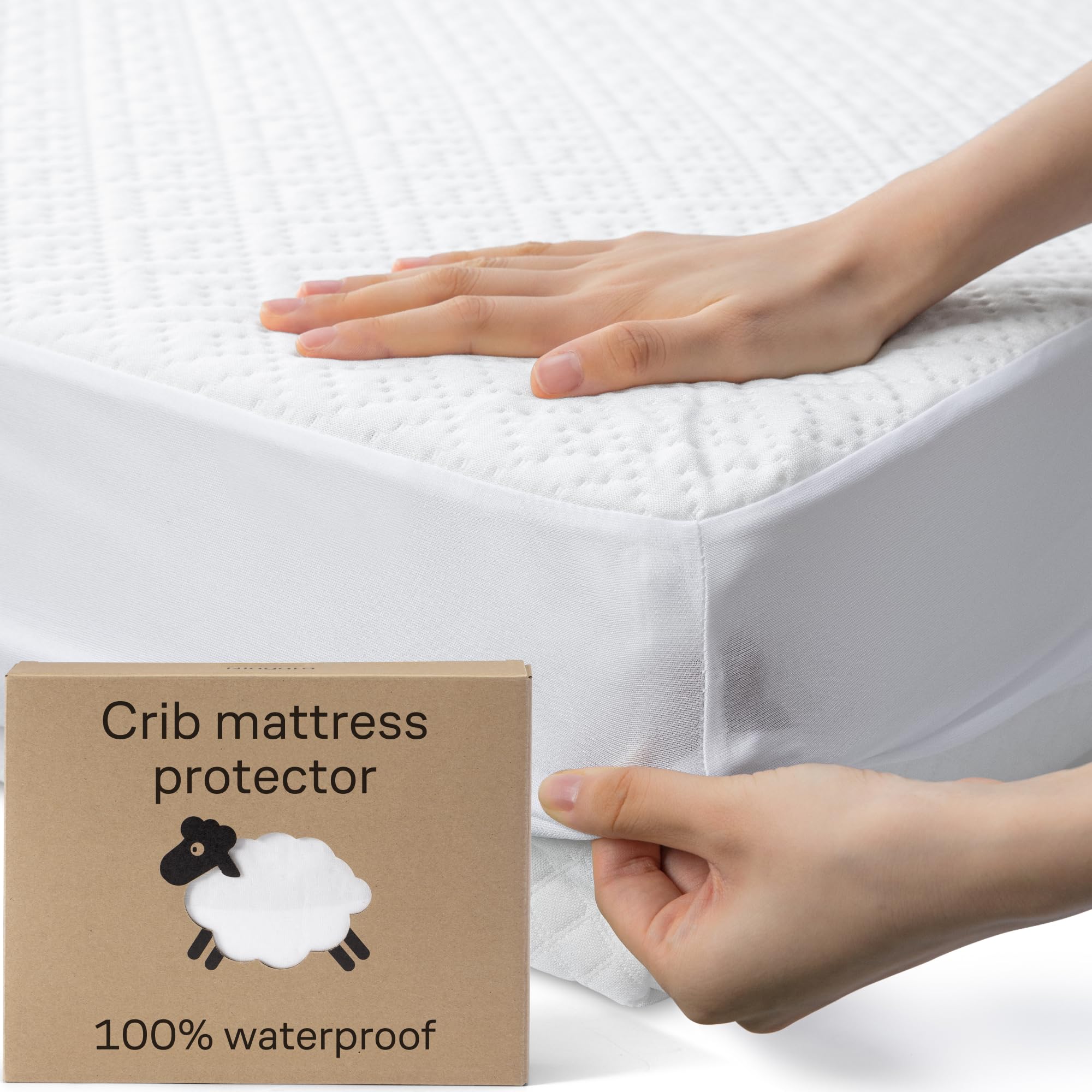 Niagara Sleep Solution bamboo crib protector folded, soft on baby skin.
