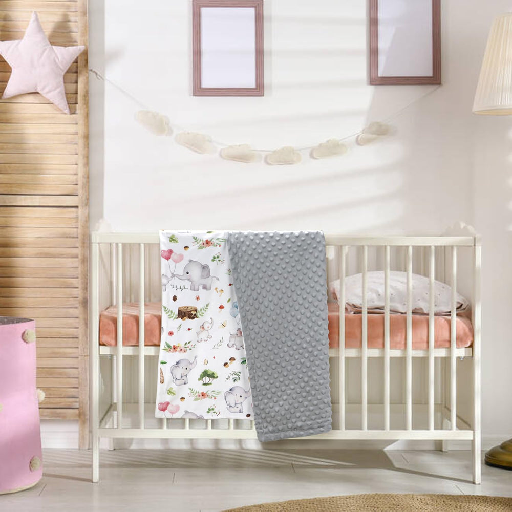 Niallant baby blanket adds neutral nursery decor charm.