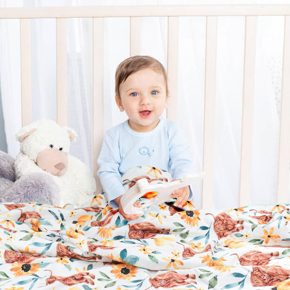 Nialnant Highland Cow Blanket doubles as a stroller cover for on-the-go comfort.