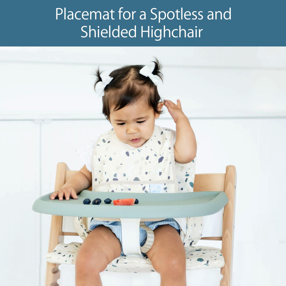 Mealtime with the Nibble and Rest placemat supports tidy, mess-friendly dining.