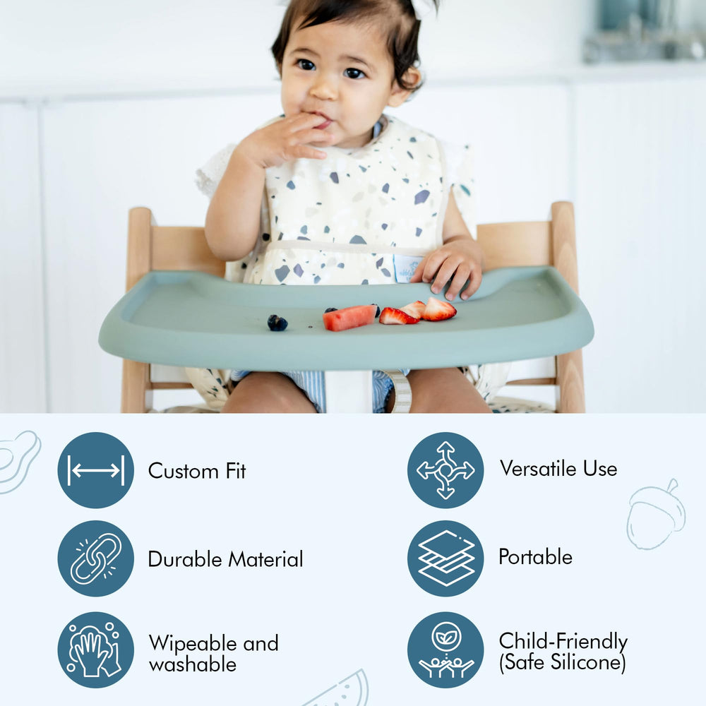 Wipeable placemat on a highchair tray enables quick post-meal cleanup.
