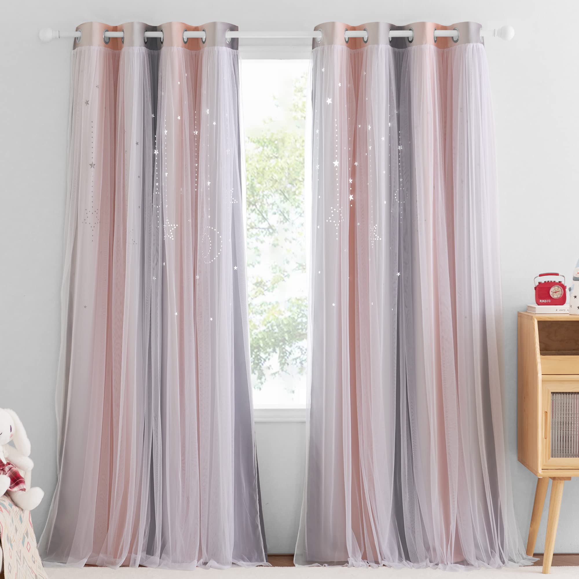 NICETOWN Moon Stars curtains create dreamy star patterns in a pink-gray girls' room.