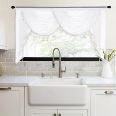 NICETOWN swag valance in white for living room, soft light and elegant ambiance.