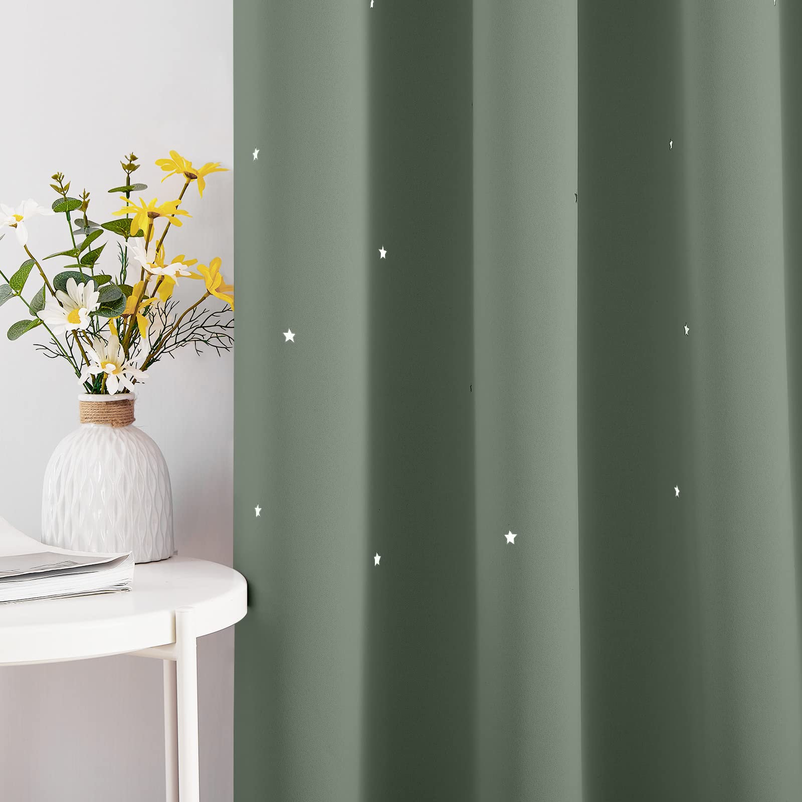 NICETOWN Sage green curtain providing daytime privacy in a child's room.