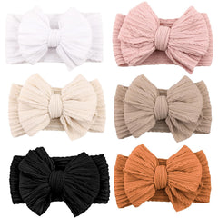Niceye baby headbands with white nylon bows for comfy everyday wear.