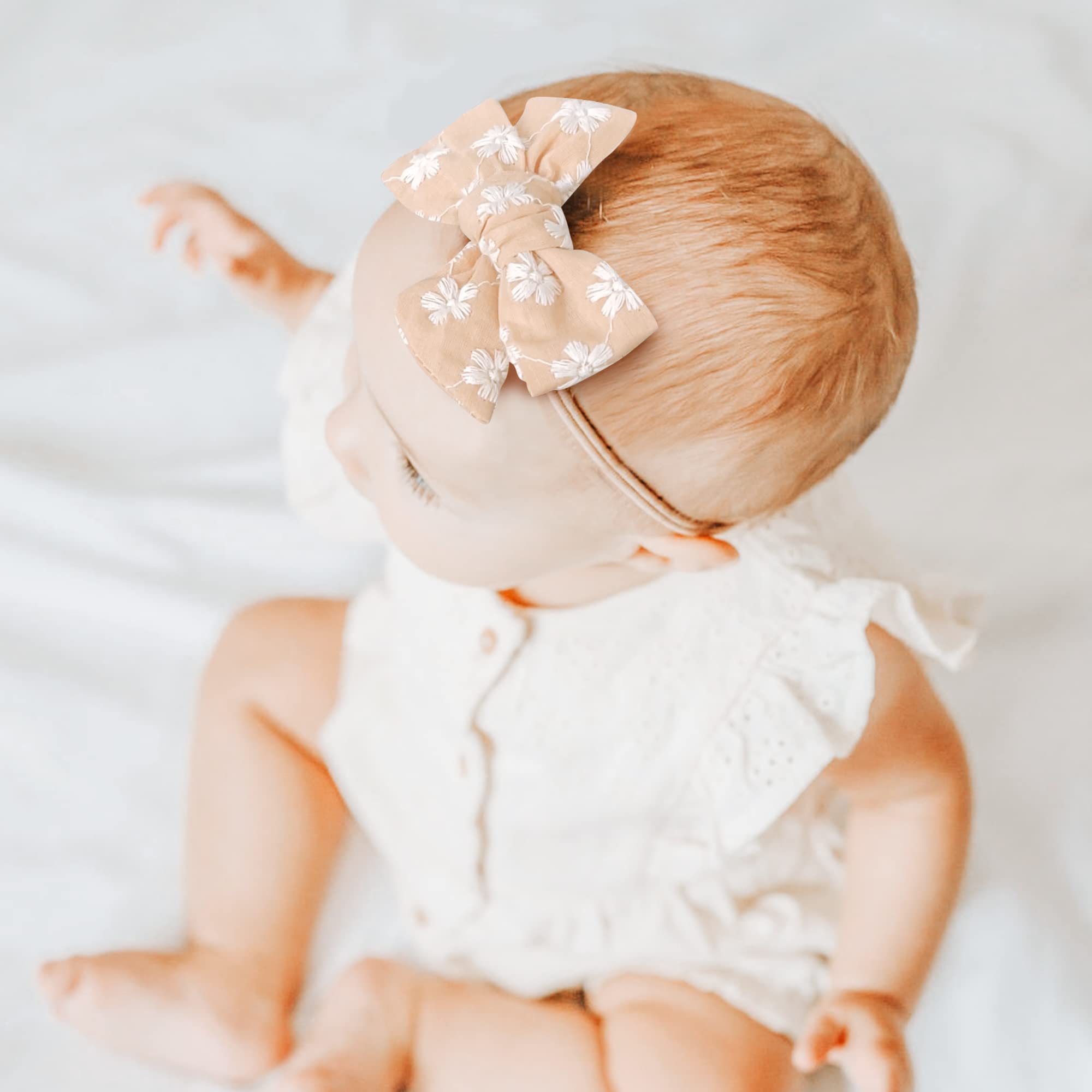 Niceye one-size stretchy headband fits infants through toddlers comfortably.