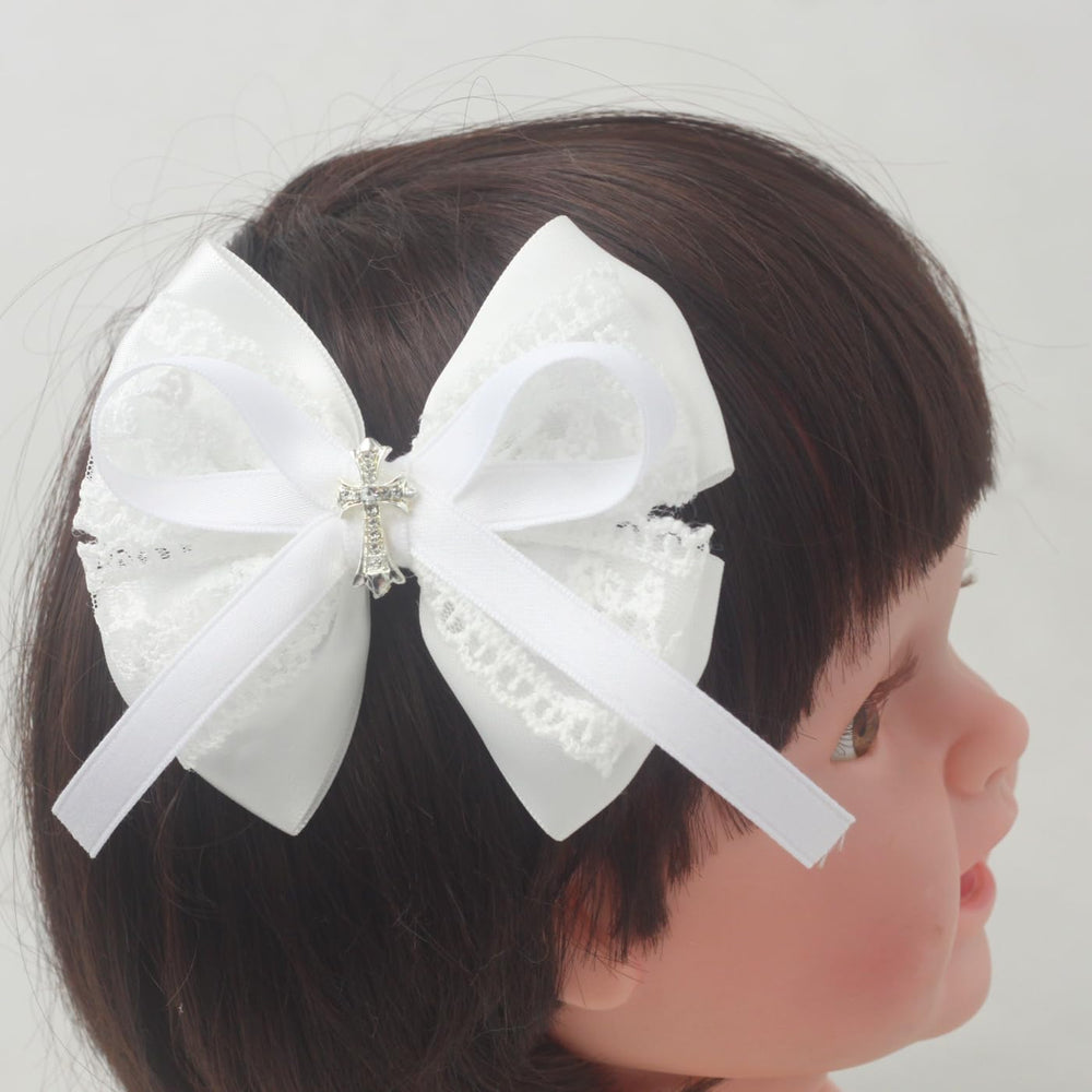 Nihao Baby bow worn at ceremony enhances little outfit.