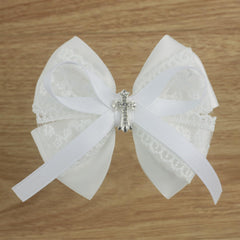 Nihao Baby bow clip close-up showing secure 1.97 inch attachment.