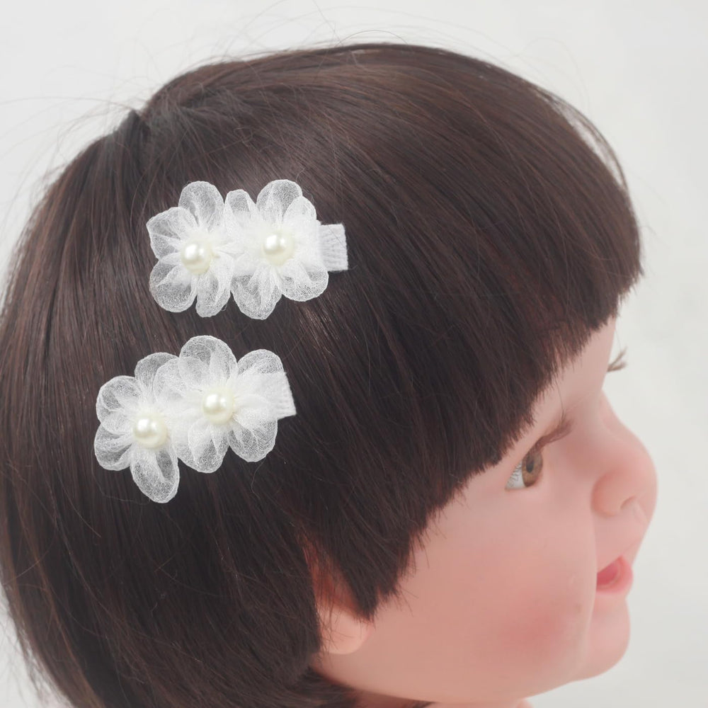 Nihao Baby christening hair clip adds a graceful white flower accent