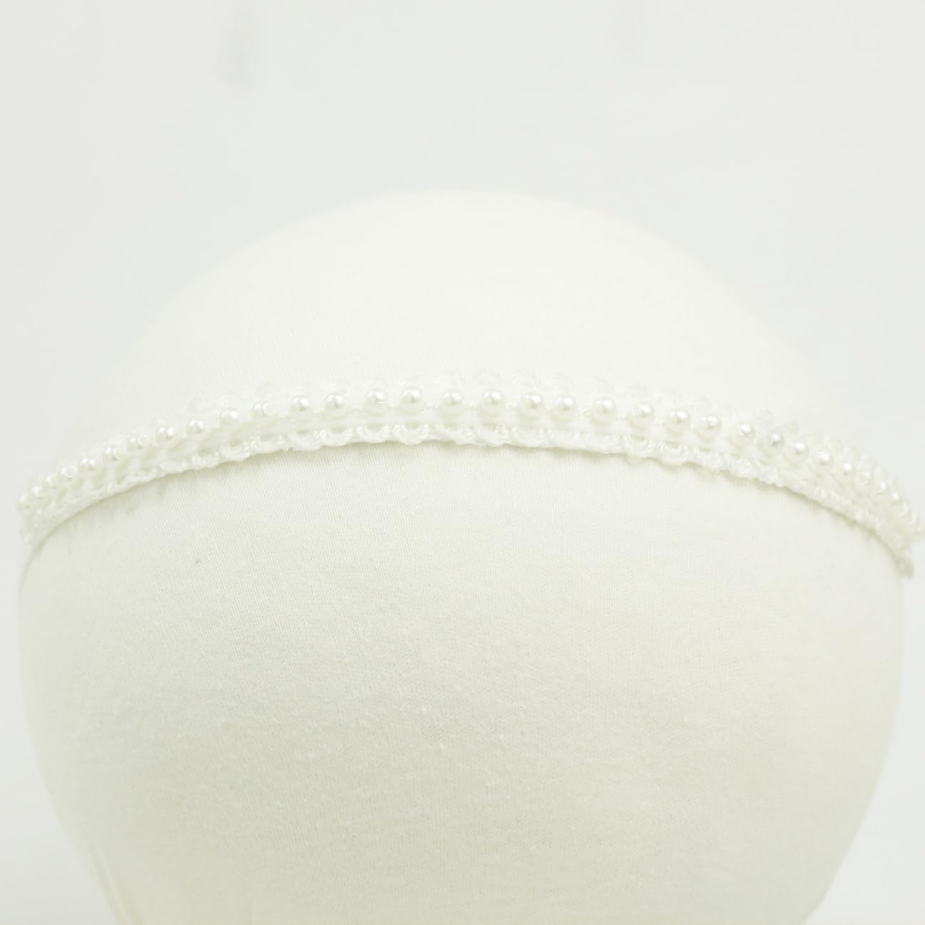 Nihao Baby headband white flower design adds cute charm to every outfit.