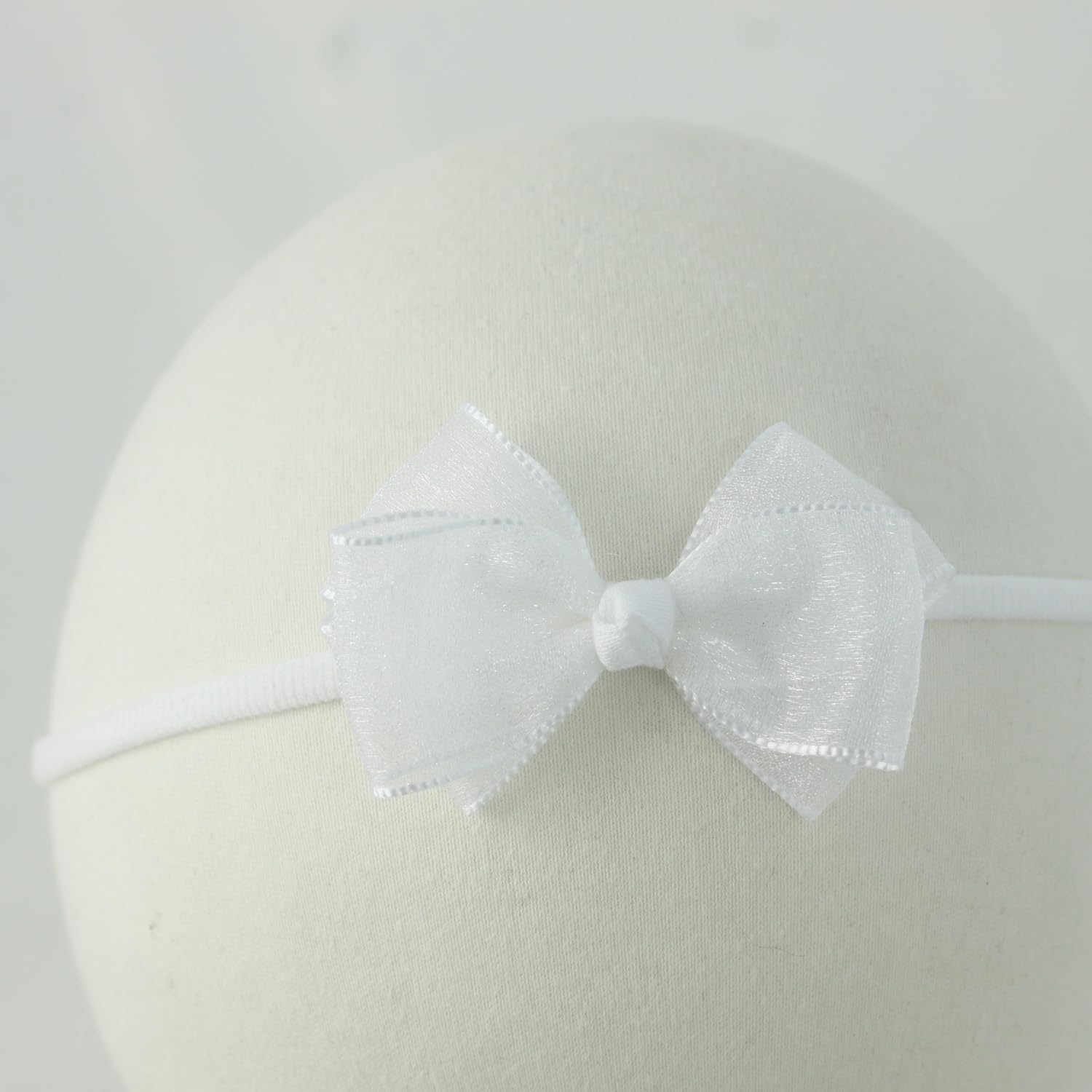 Nihao Baby headbands with small parts; supervision recommended during wear