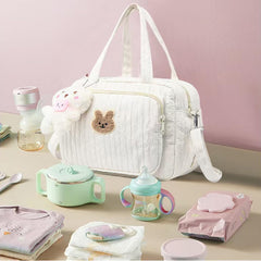 NIKUKY diaper bag with cute cartoon pattern adds style to outings.
