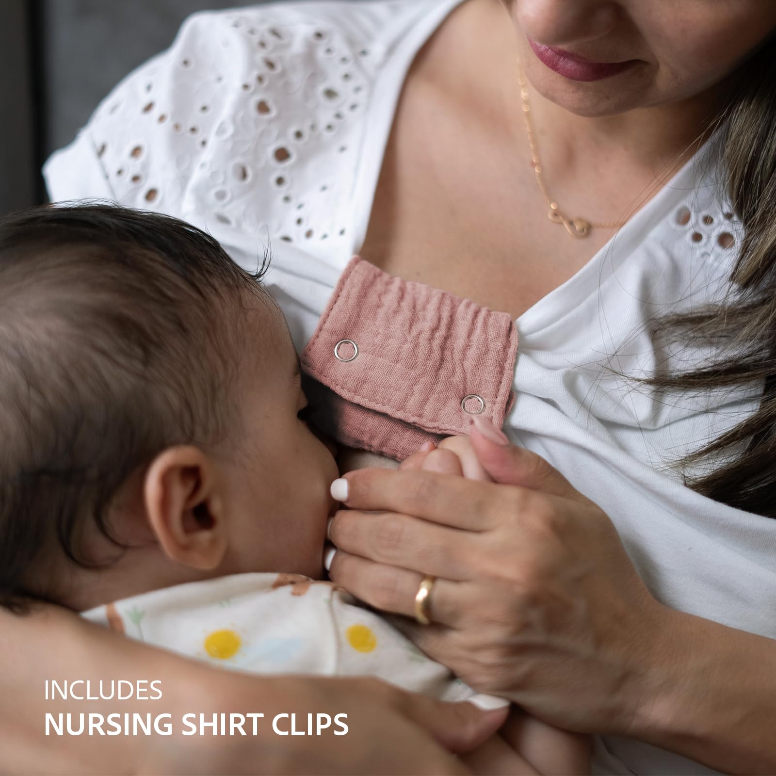 Nursing cover shows hidden zippered opening for quick checks.