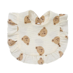 Nishine baby wearing bib with button closure for quick changes.