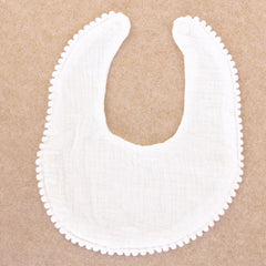 Nishine bib snap closure demonstrates easy on/off during meals
