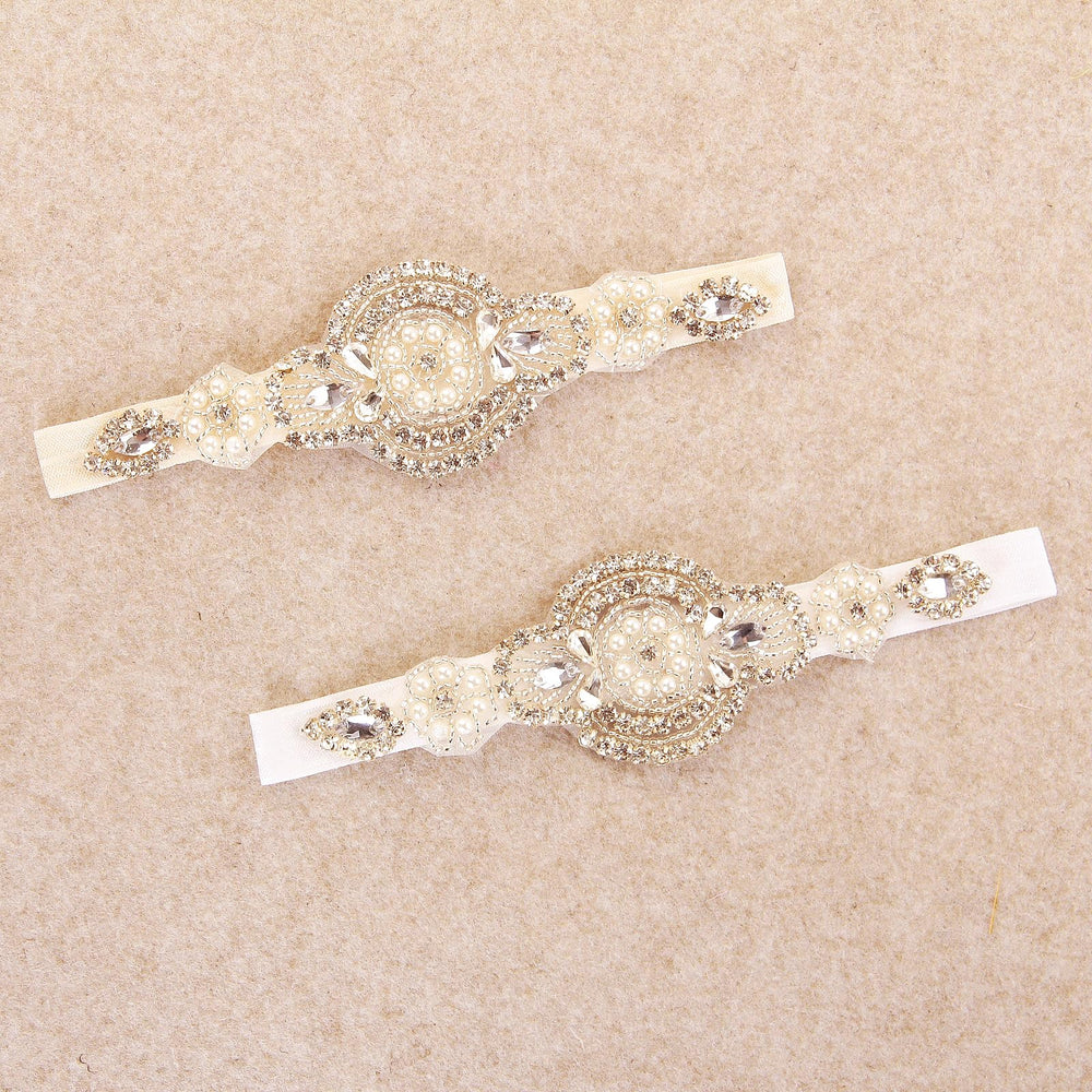 Nishine rhinestone baby headband with elastic band for comfortable wear.