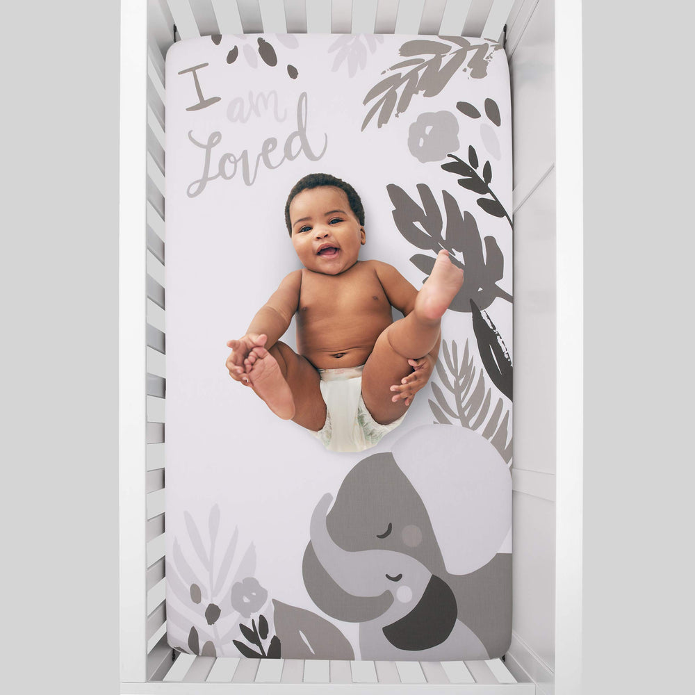 NoJo 100% cotton crib sheet offers a soft touch for comfortable naps.