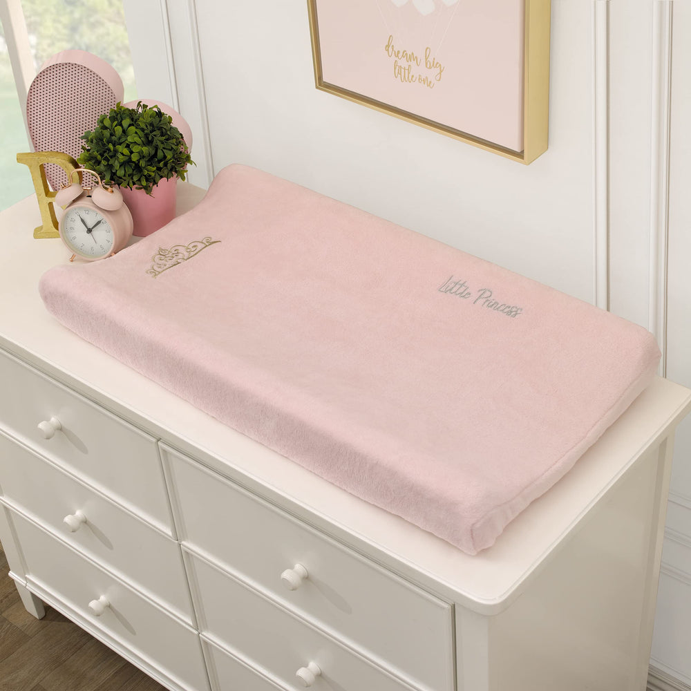 NoJo Disney Princess Enchanting Dreams cover shows gold crown embroidery, adding regal charm to diaper changes.