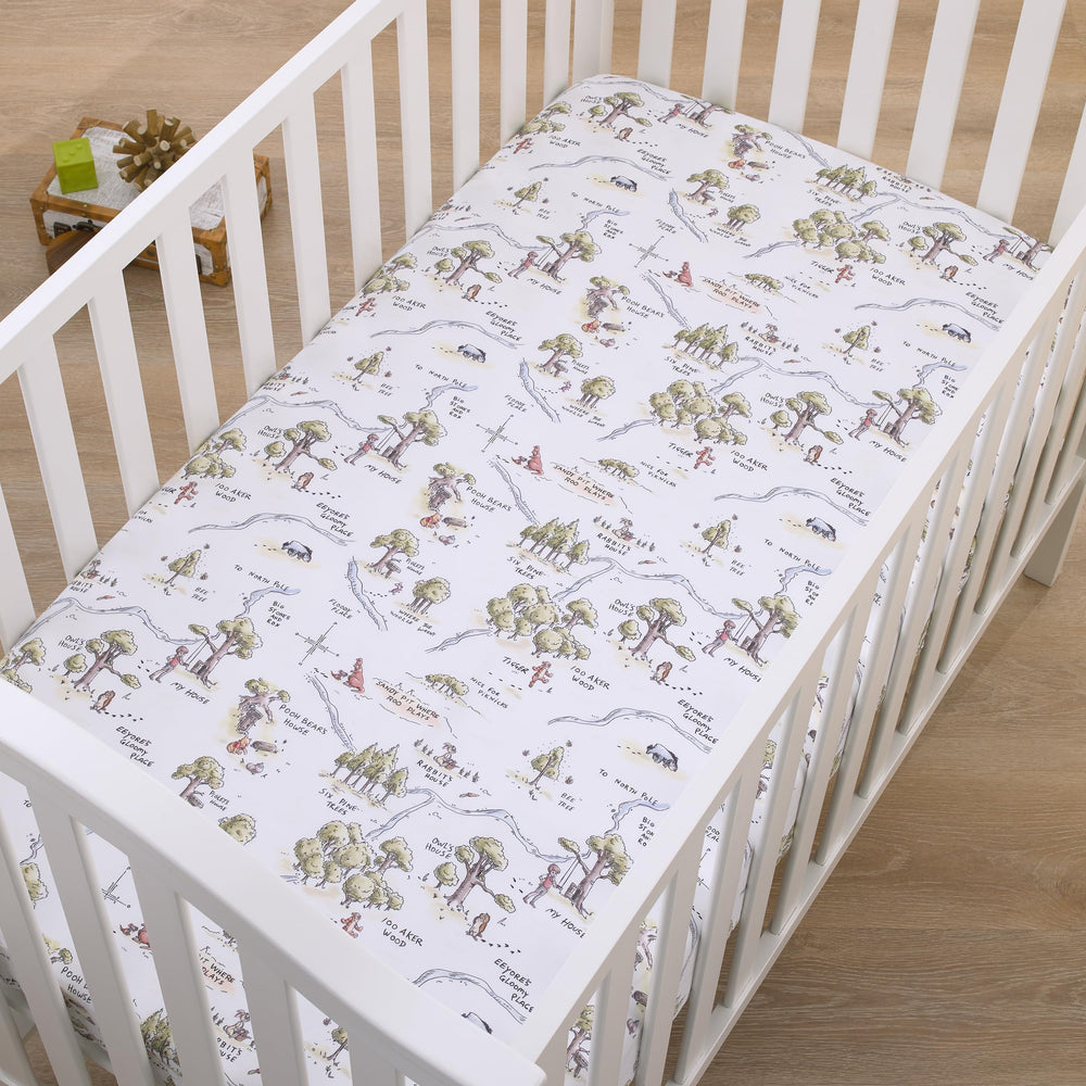 NoJo Pooh crib sheet in ultra-soft material for gentle naps.