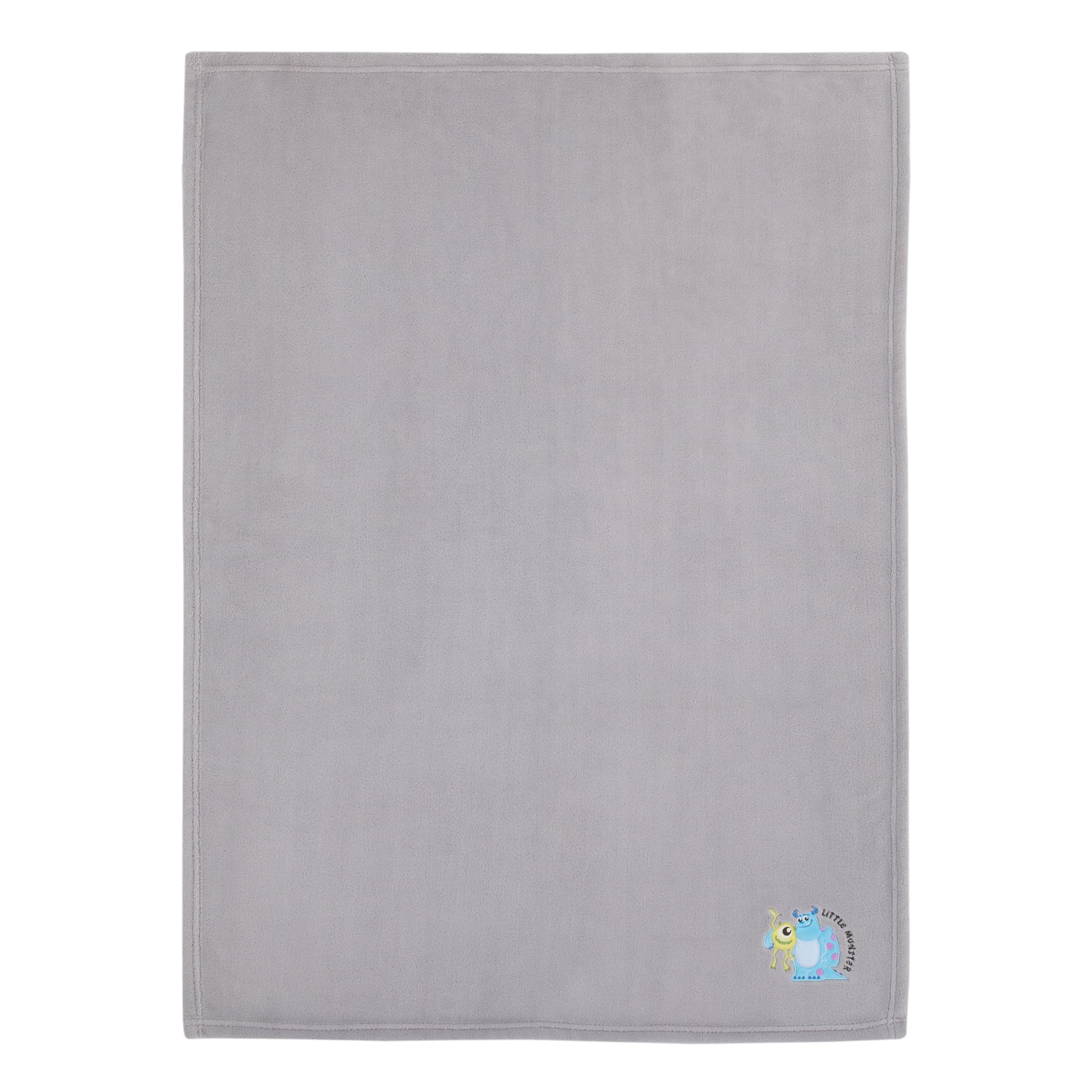 Gray turquoise green colorway complements nursery decor with a friendly character vibe