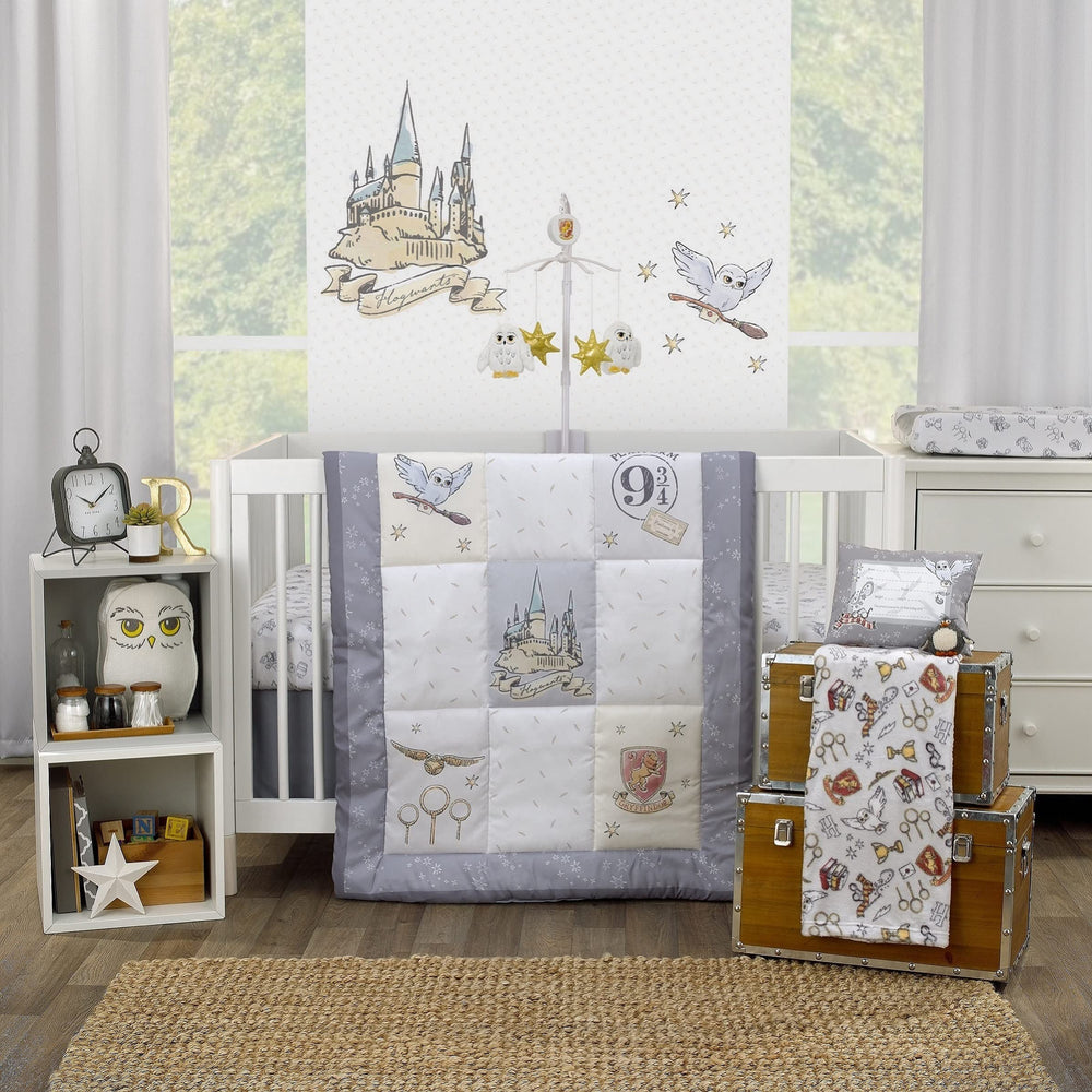 NoJo Harry Potter musical mobile mounted above crib spins softly.