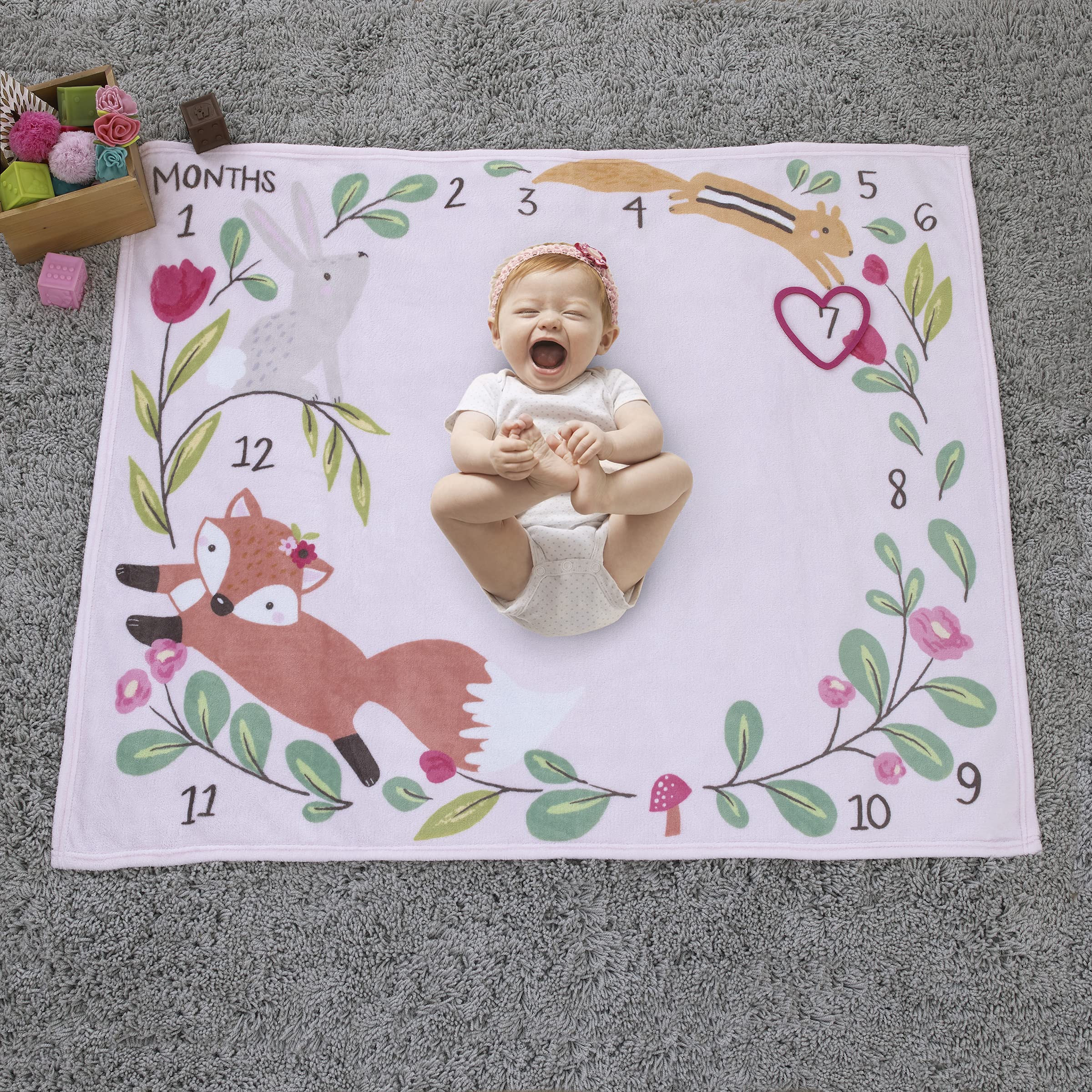 NoJo Little Love heart-cutout marks monthly milestones for easy progress tracking