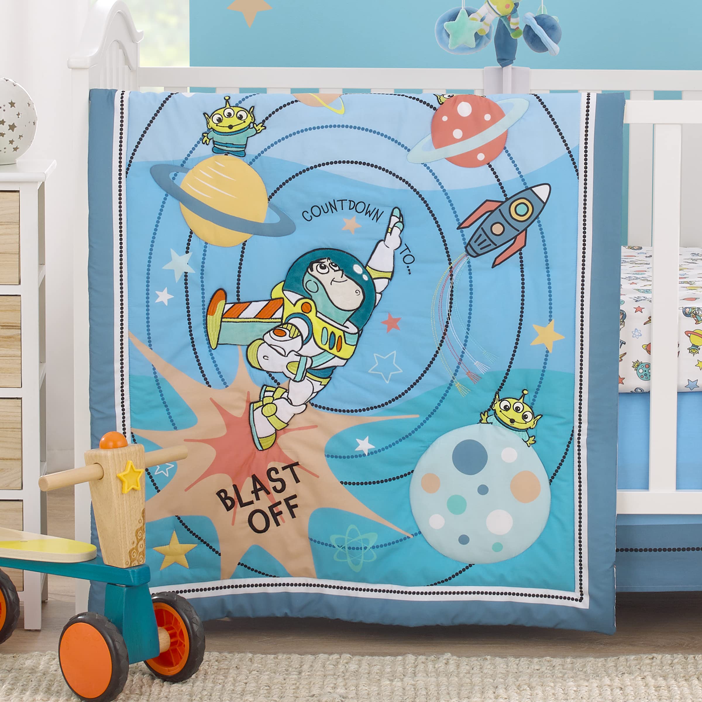 NoJo three-piece set includes comforter, sheet, and crib skirt for simple setup.