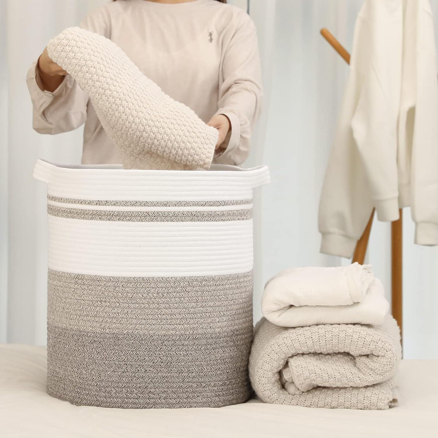 Nonazippy neutral beige basket blends with wood, linen, and rattan accents.
